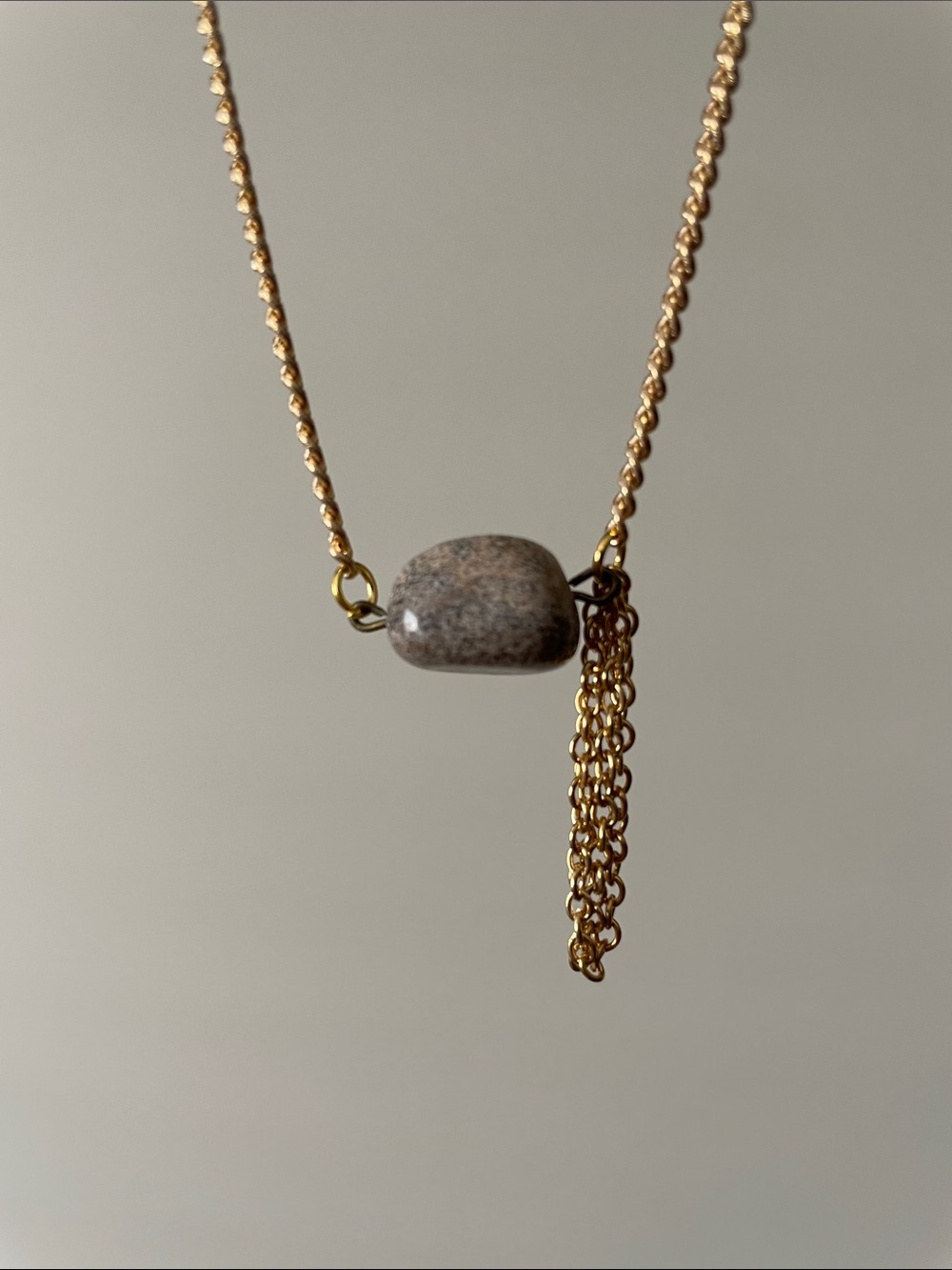 Brown, black, and white stone dangle chain necklace